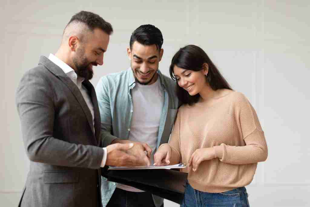 New couple speaking to a mortgage broker in London